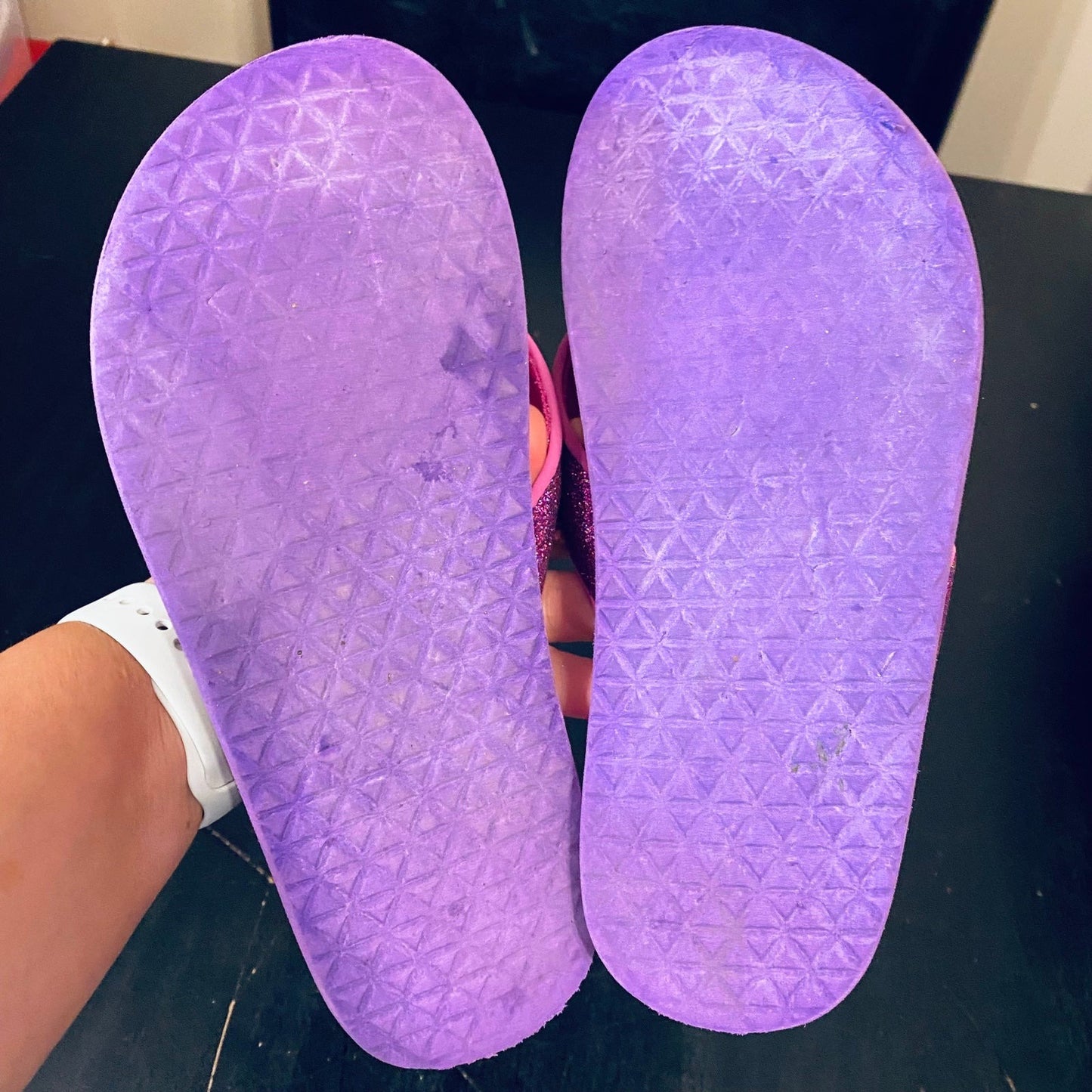 Size 4 pink Teva flip flops