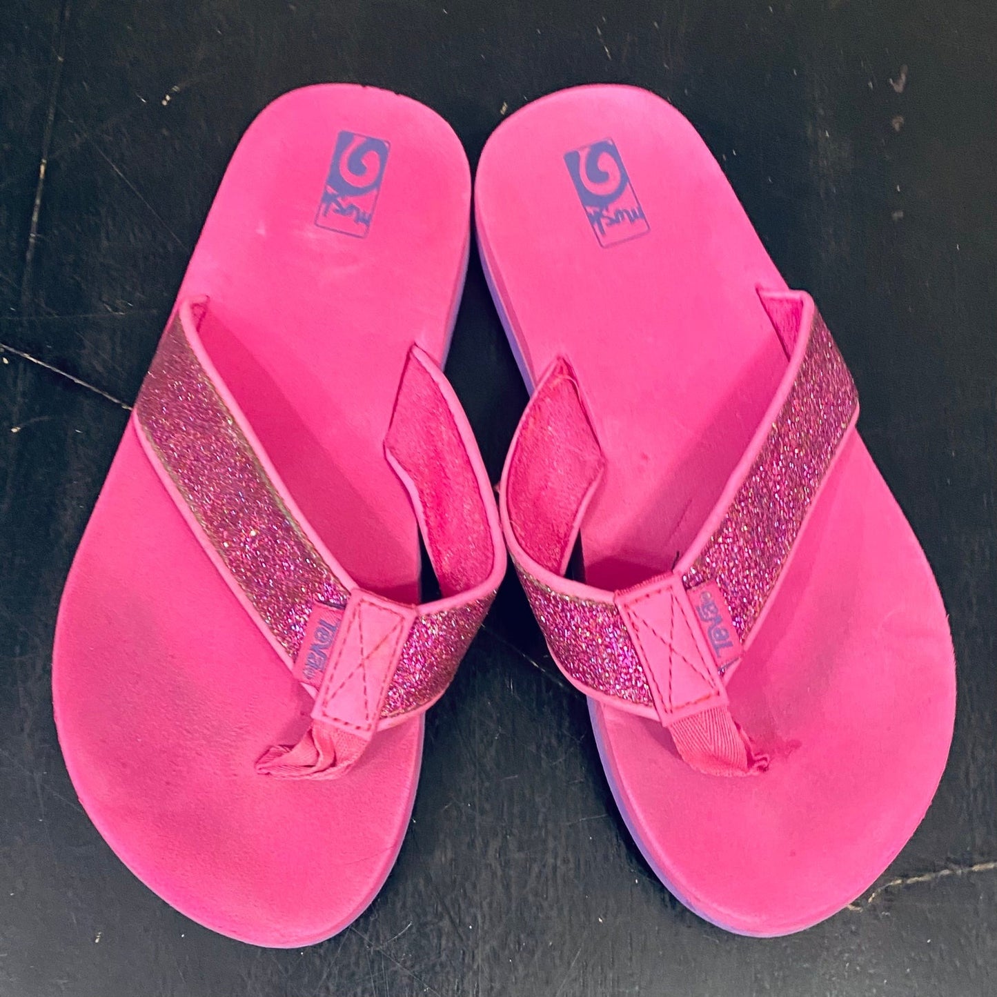 Size 4 pink Teva flip flops