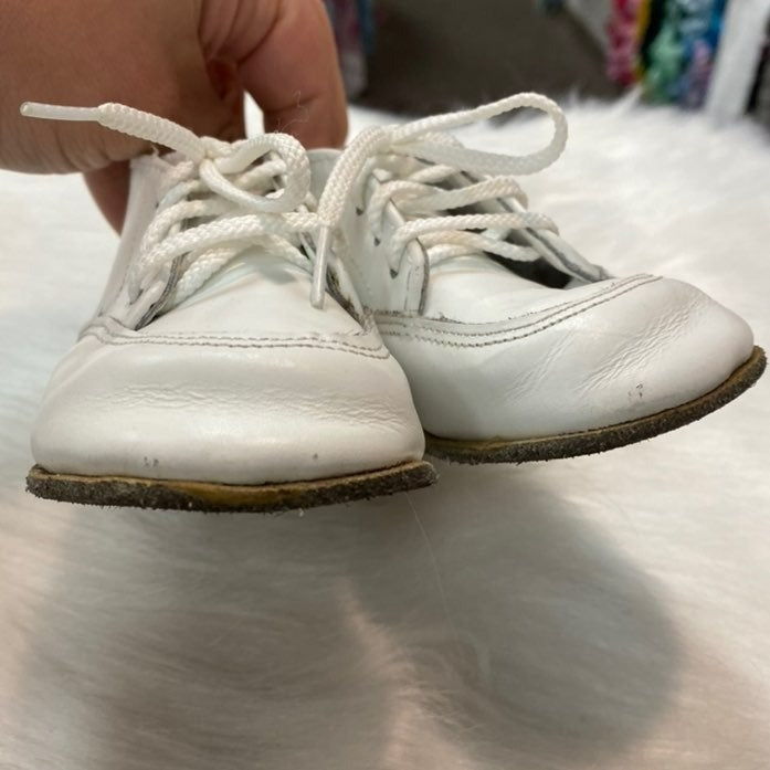 Size 4.5 white vintage hard bottom shoes