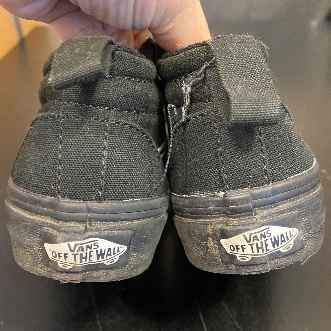 Kids size 11 black high top Vans skeleton sneakers