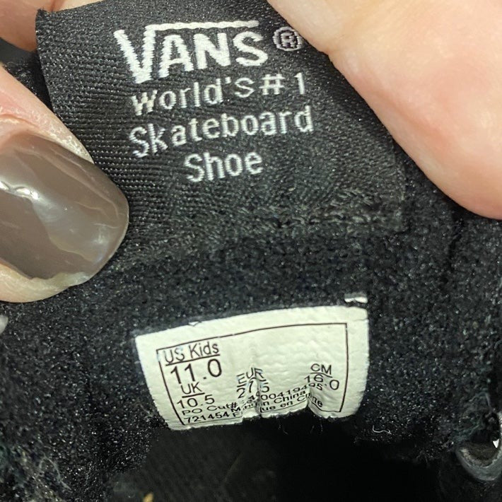 Kids size 11 black high top Vans skeleton sneakers