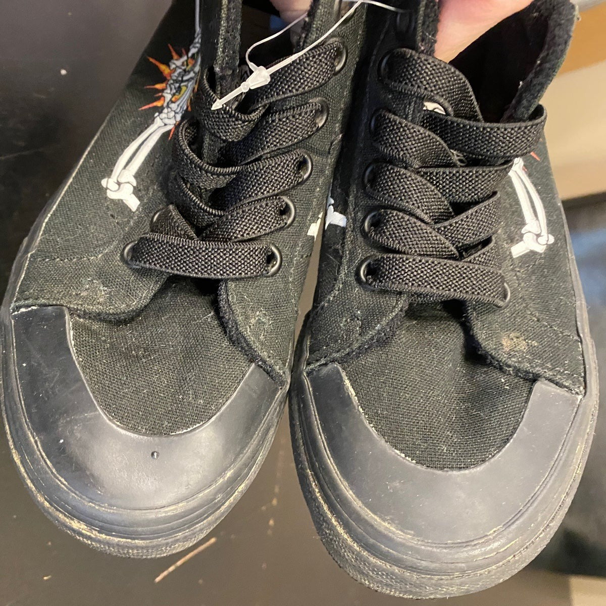 Kids size 11 black high top Vans skeleton sneakers