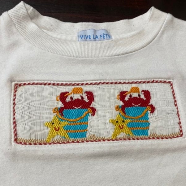 Size 2 smocked crab tee