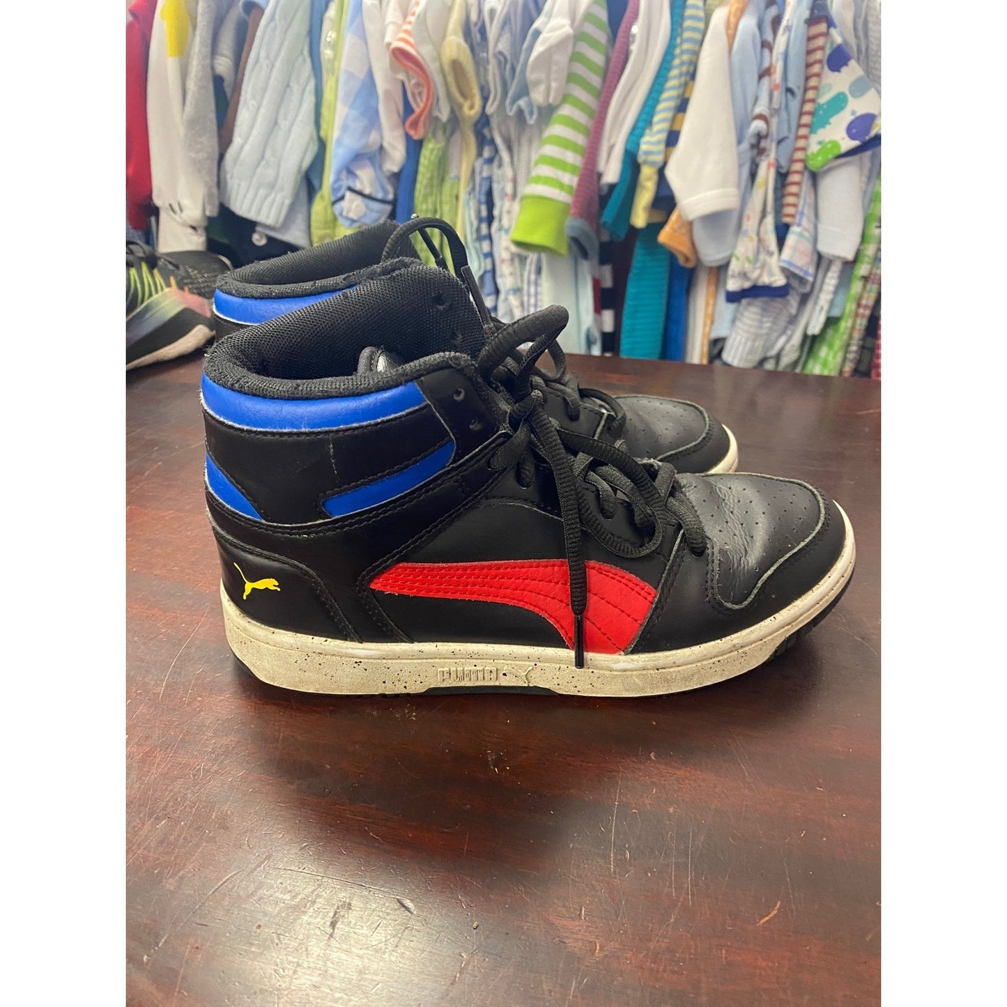 Size 4 Youth Puma high top sneakers